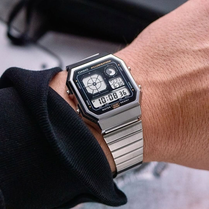 Reloj Casio A130WE-1A negro y plateado unisex original en Perú - detalle de caja y correa