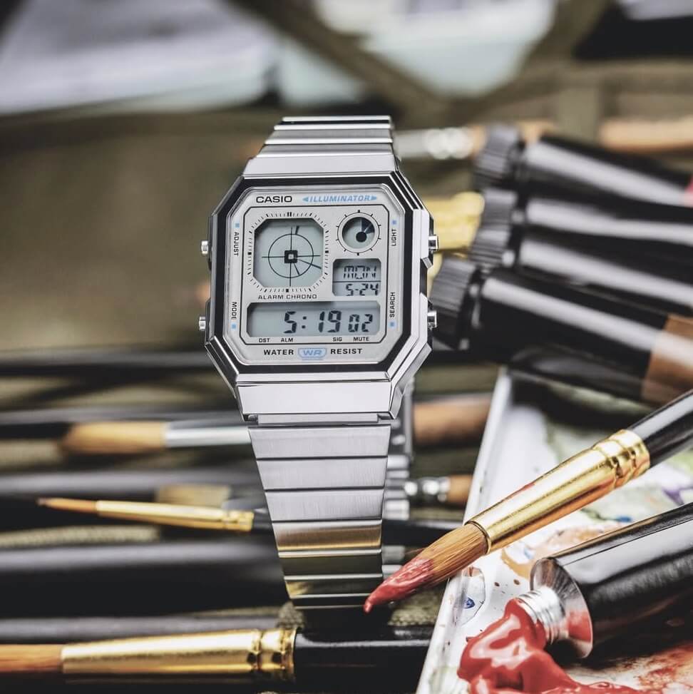 Reloj Casio A130WE-7A plateado claro unisex original en Perú - detalle de caja y correa