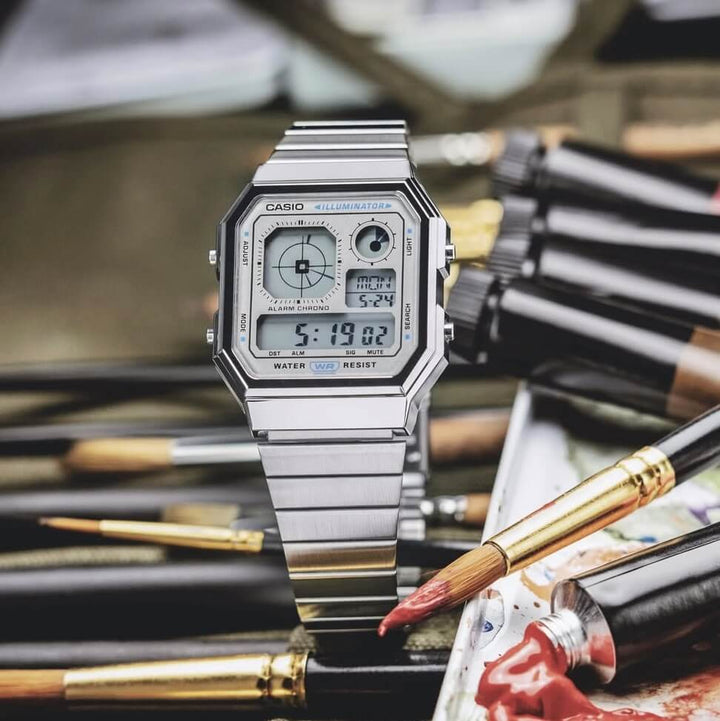 Reloj Casio A130WE-7A plateado claro unisex original en Perú - detalle de caja y correa
