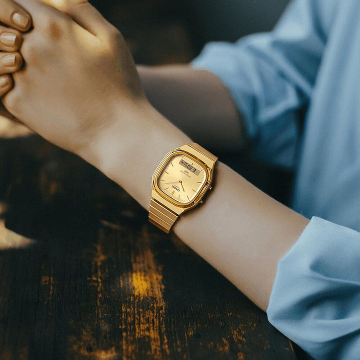 Reloj Casio AQ-240EG-9A esfera champagne sunray display dual y hora dual detalle | Jherr Perú