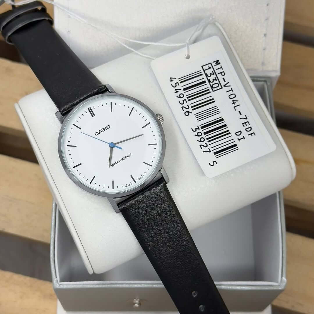 Reloj Casio MTP-VT04L-7E blanco y negro hombre original en Perú - detalle de caja y correa