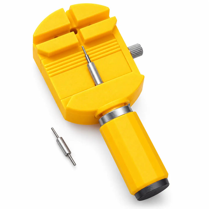 Extractor de eslabones para reloj JHERR amarillo con punta metálica sobre fondo blanco